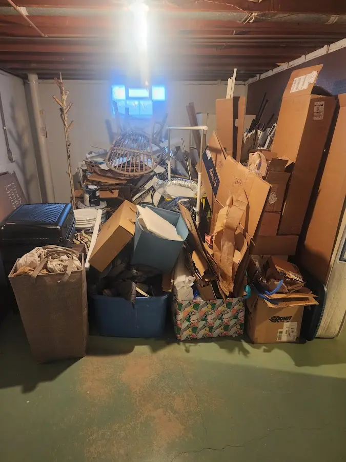 Roll-off dumpster container at job site for 2 Yard Dumpster Rental in Middletown